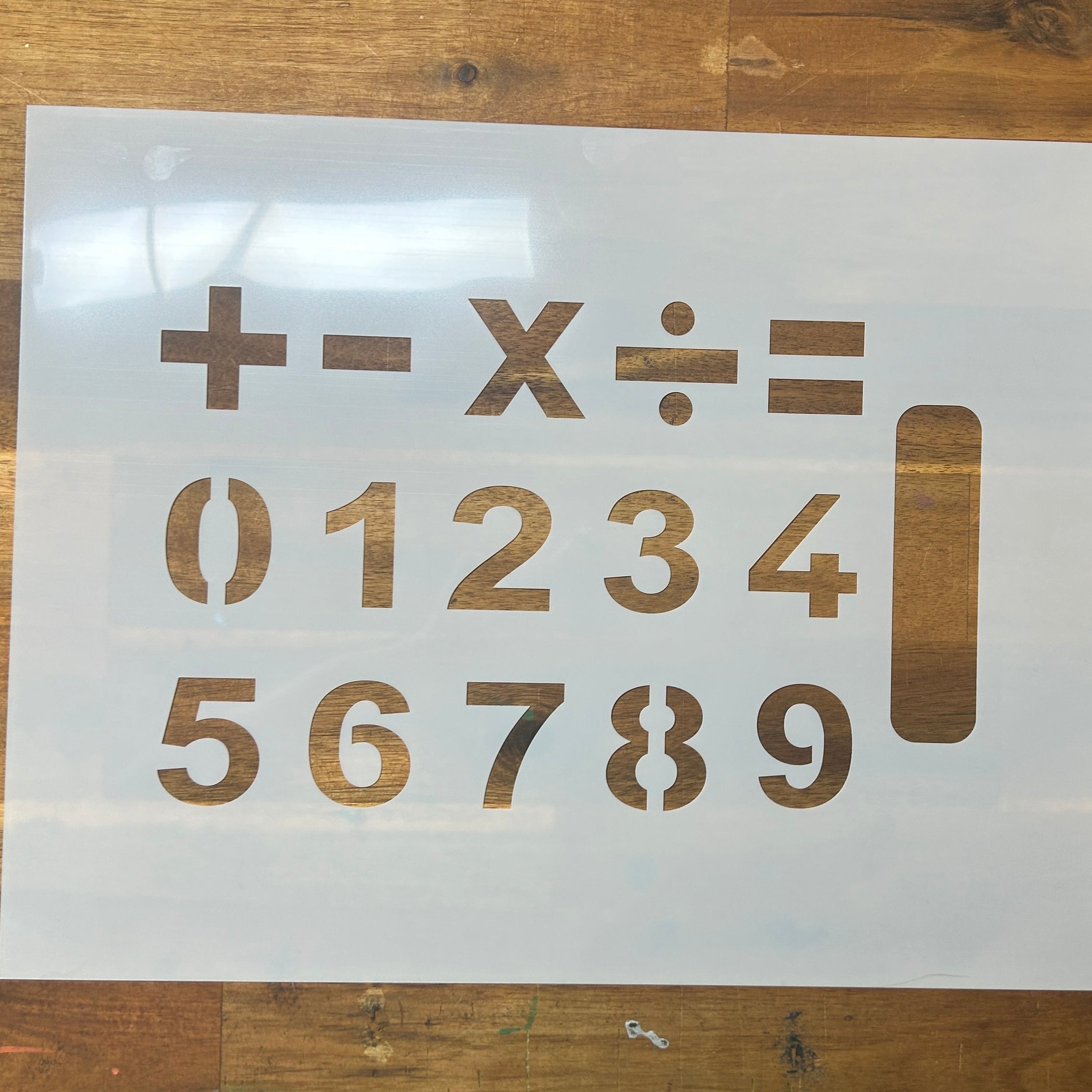 Small Number stencil made from mylar with custom calculator added