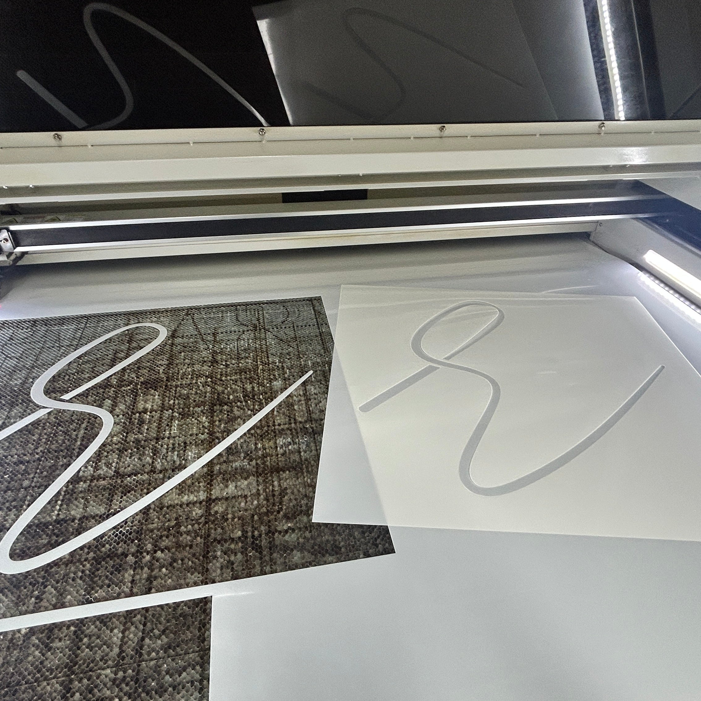 Large custom Mylar stencil in our laser machine.