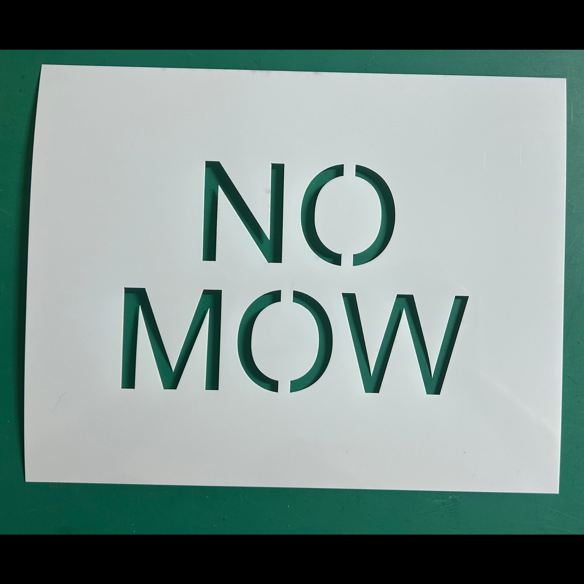 Durable "No Mow" zone stencil for grass and garden maintenance, ideal for landscape branding and environmental safety marking.